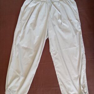 Women's Athleta, parachute sports functional pants, biege, size 4P.